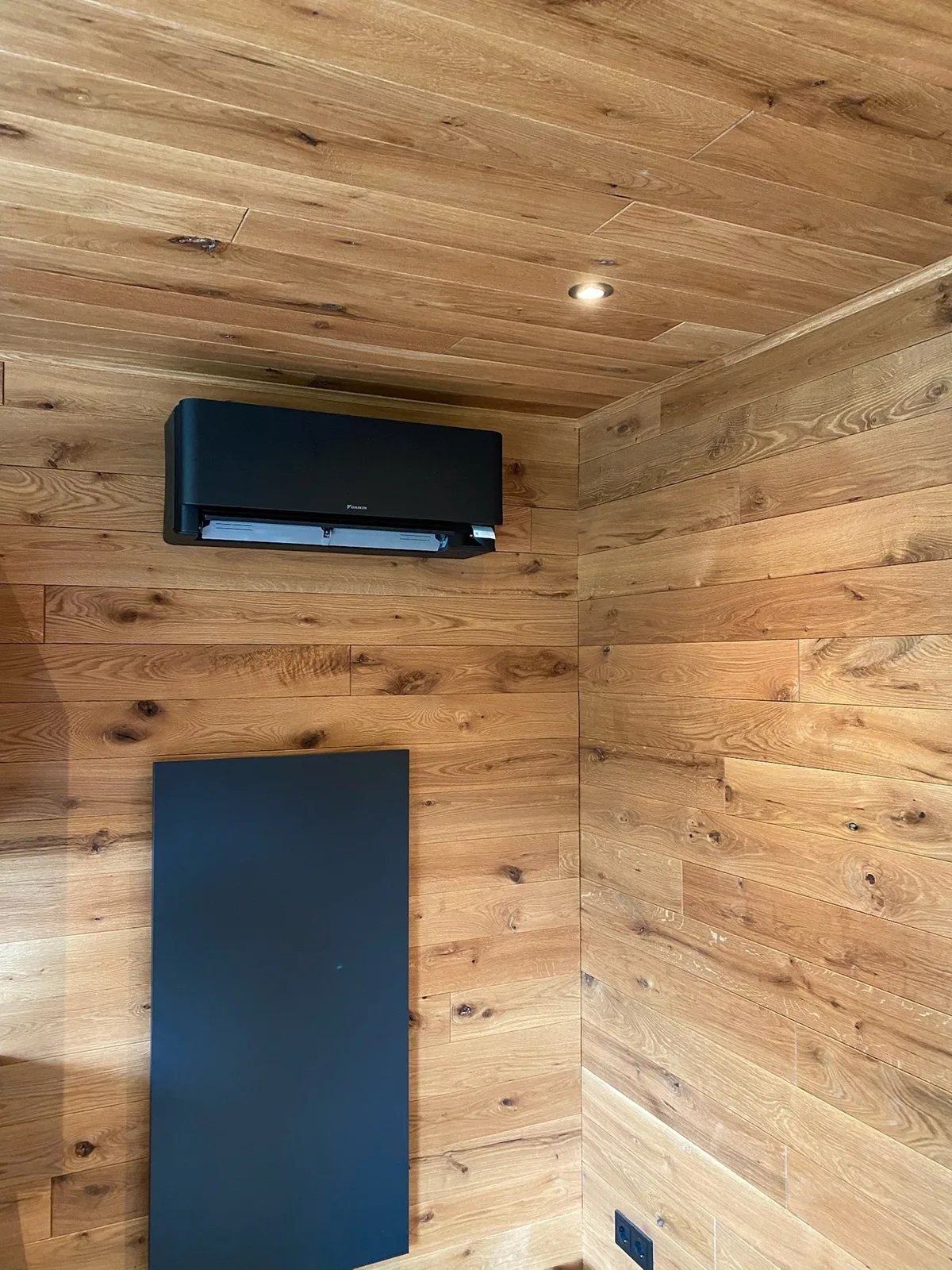 Wall unit on timber cladding